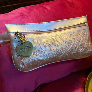 Hand tooled leather fanny pack from Chicana leather luxury designer in dusty rose or metallic powder pink